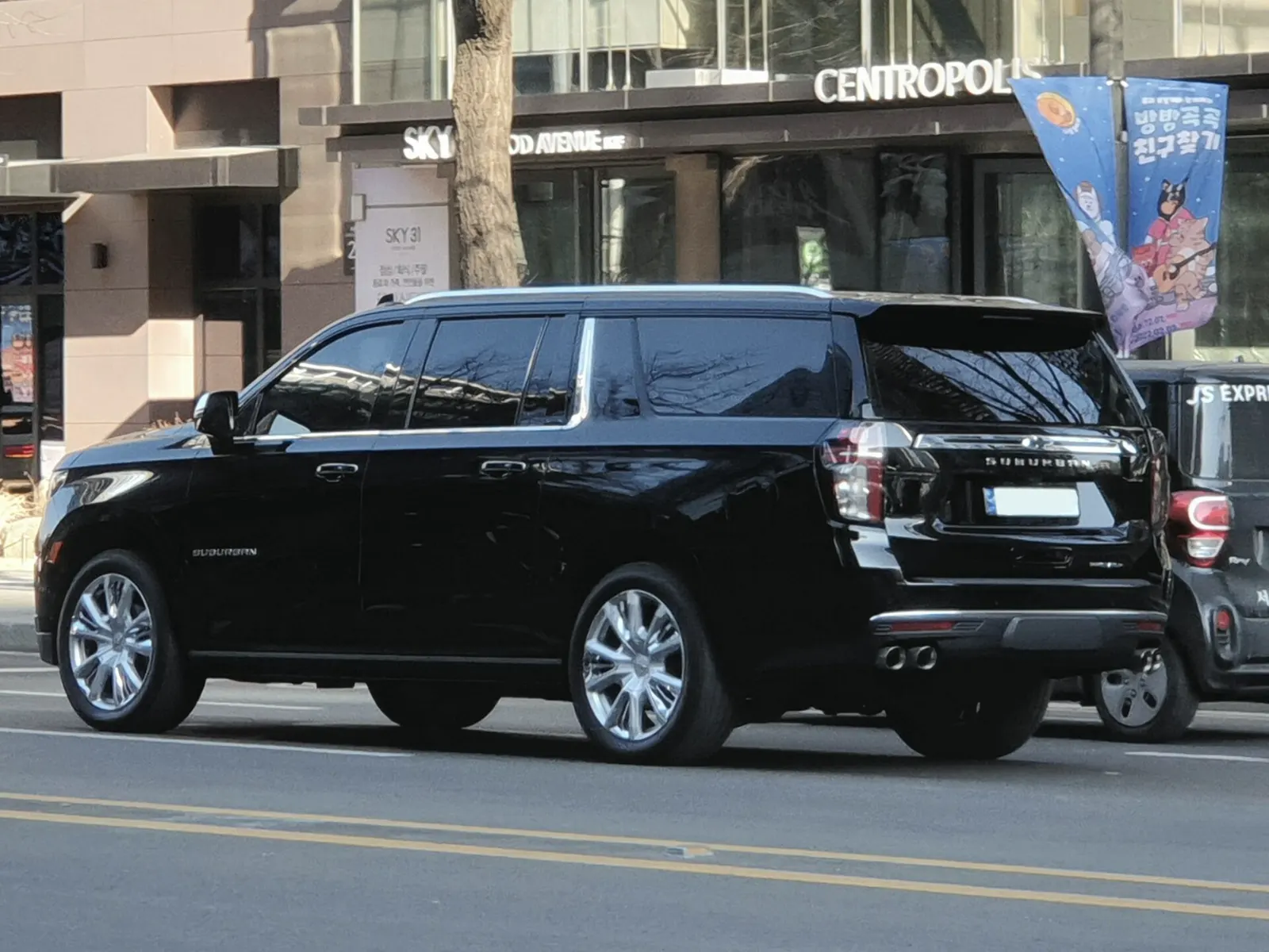 Rear view of a black Chevrolet Suburban